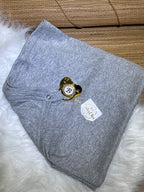 Manta em fio egípcio com prendedor de chupeta