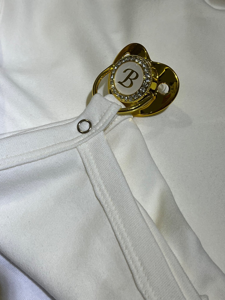 Manta em fio egípcio com prendedor de chupeta