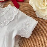 Pérolas c/shortinho vermelho