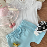 Pérolas c/ shortinho azul