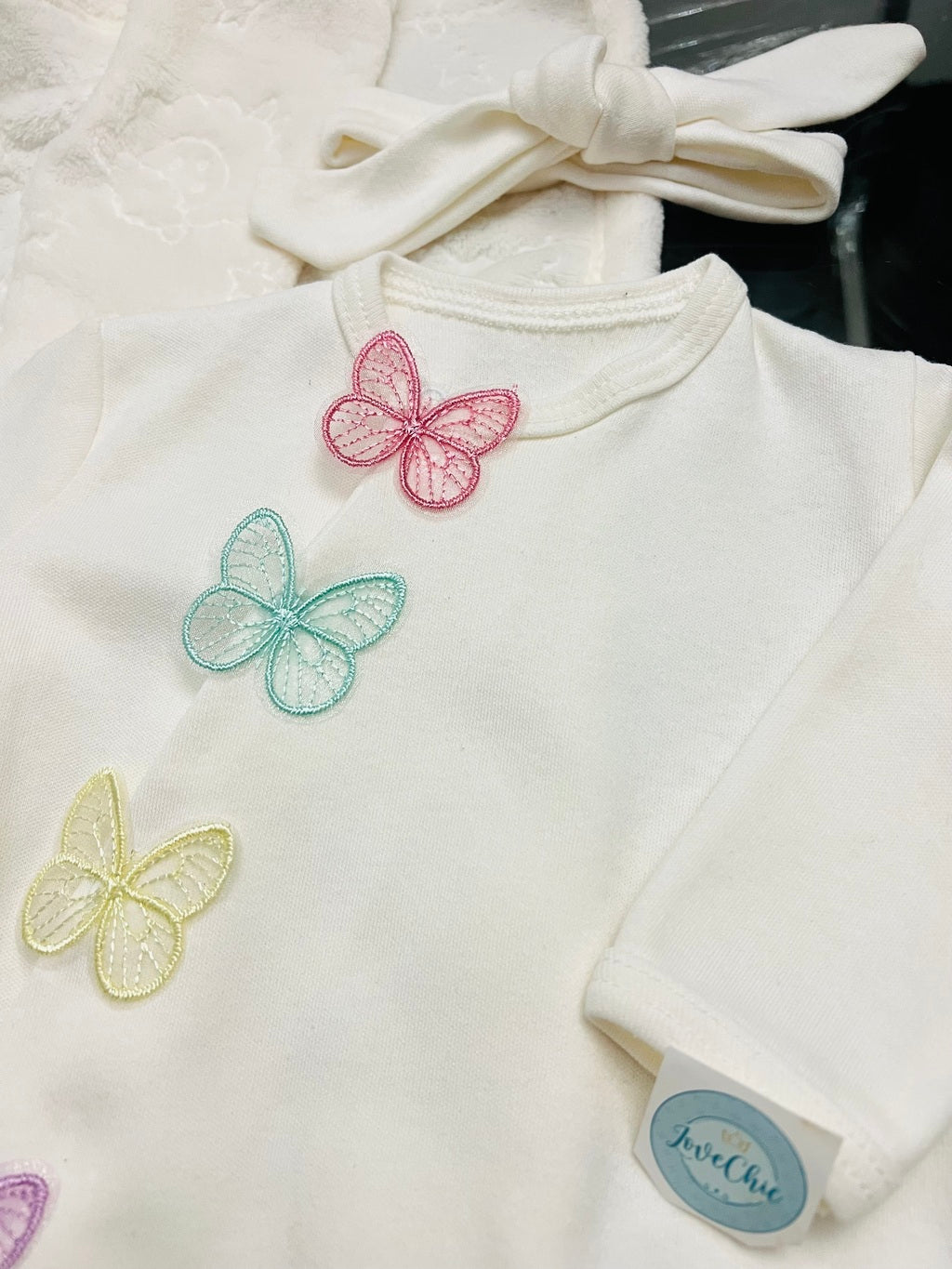 Saída maternidade borboleta