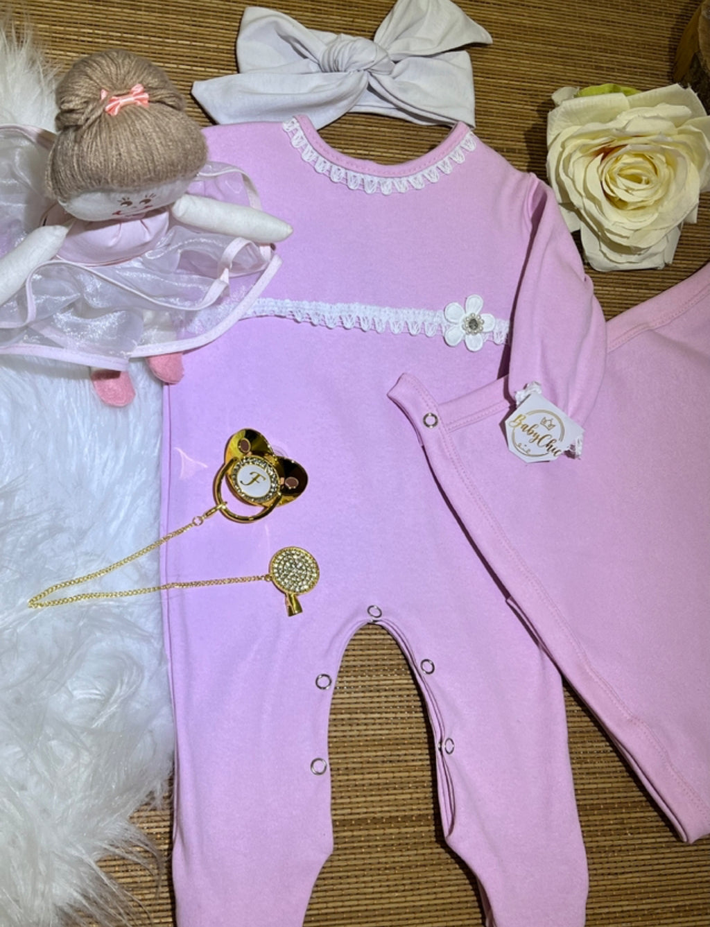 Manta em fio egípcio com prendedor de chupeta