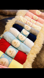 Manta em fio egípcio com prendedor de chupeta